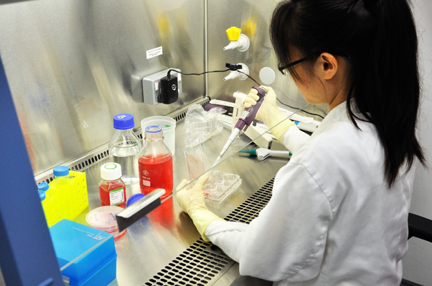 Photo of technician conducting fecal calprotectin test procedure